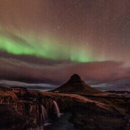 kirkufell mountain waterfall northern lights