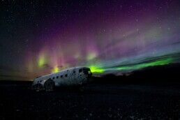 Northern Lights over Iceland's plane wreck