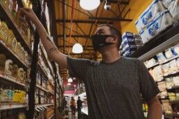 man in t-shirt shopping