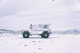 jeep in thick snow road in Iceland