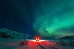 exploring iceland northern lights while riding a car