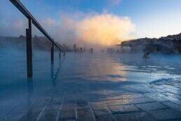 dipping in blue lagoon in Iceland