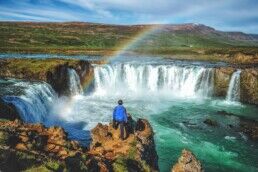 person standing on lake myvatn